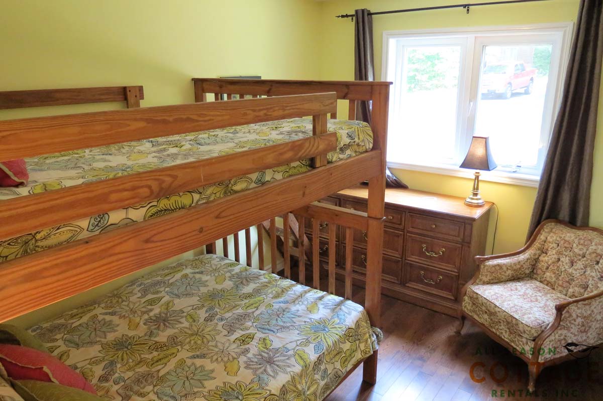 Bedroom #3 has double over double bunk beds and is located on the main floor